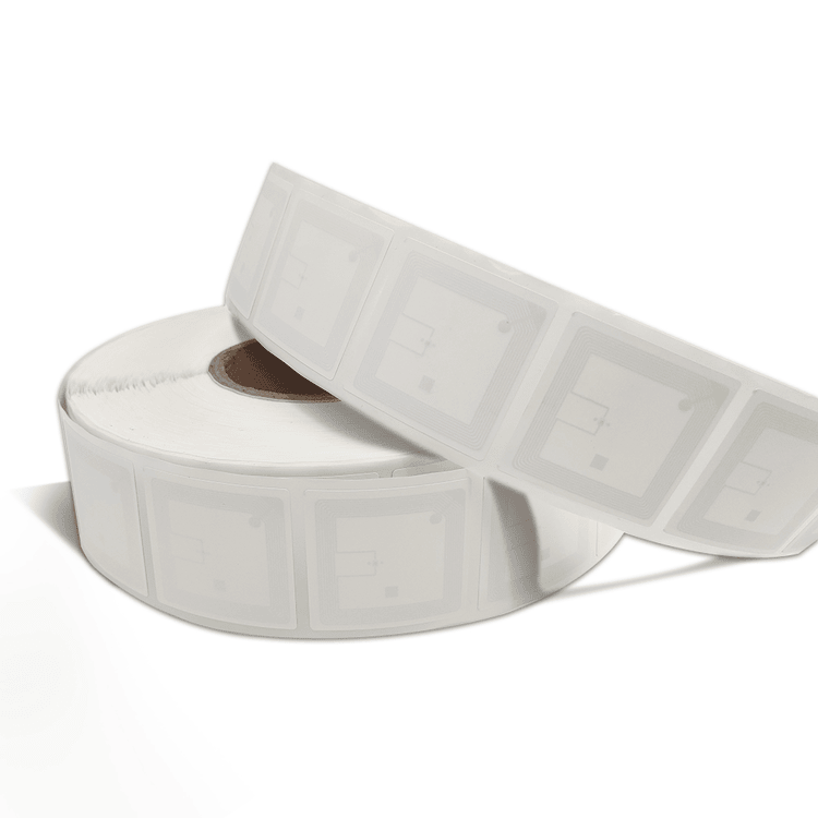Imaginea arată o rolă de etichete RFID pentru cărți, cu o bandă trecută peste partea superioară pentru a evidenția construcția în straturi.