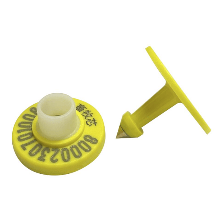 Imagine de detaliu a crotaliei RFID E-029 galbene cu marcaj laser și știftul compatibil.